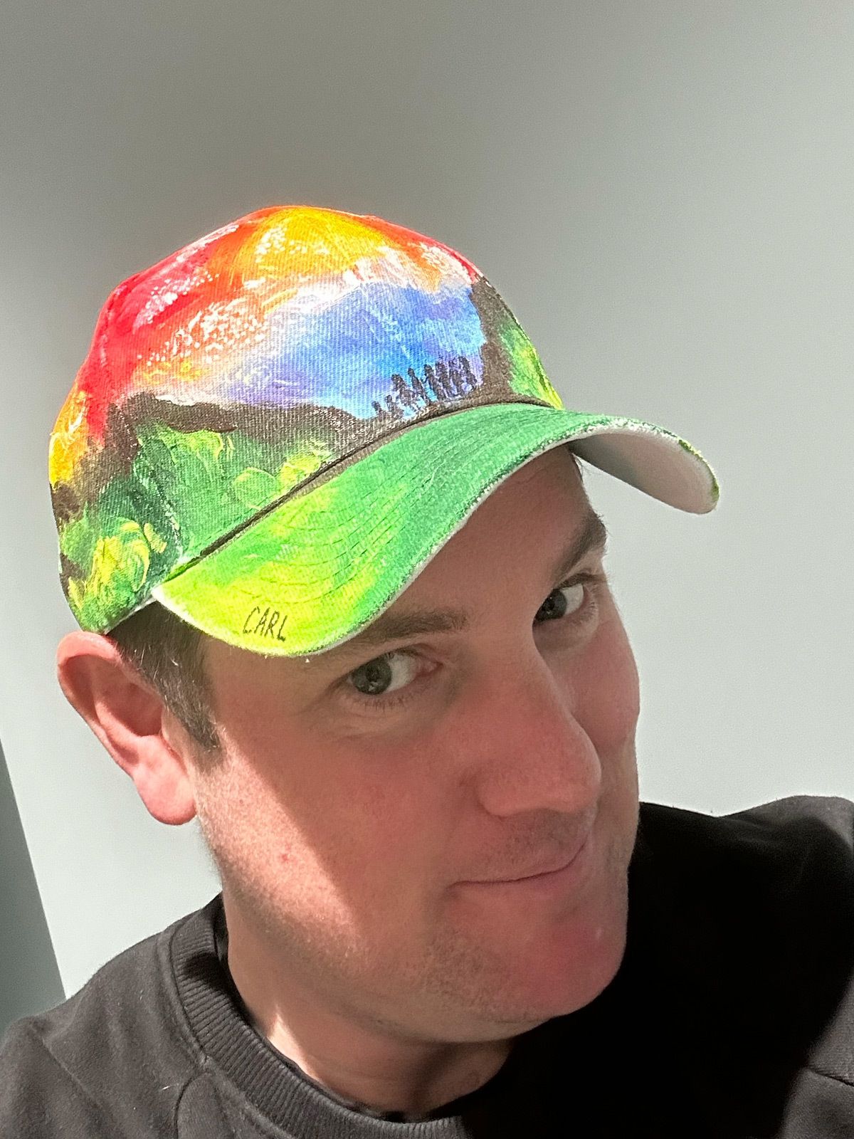 Carl in a colorful hat.